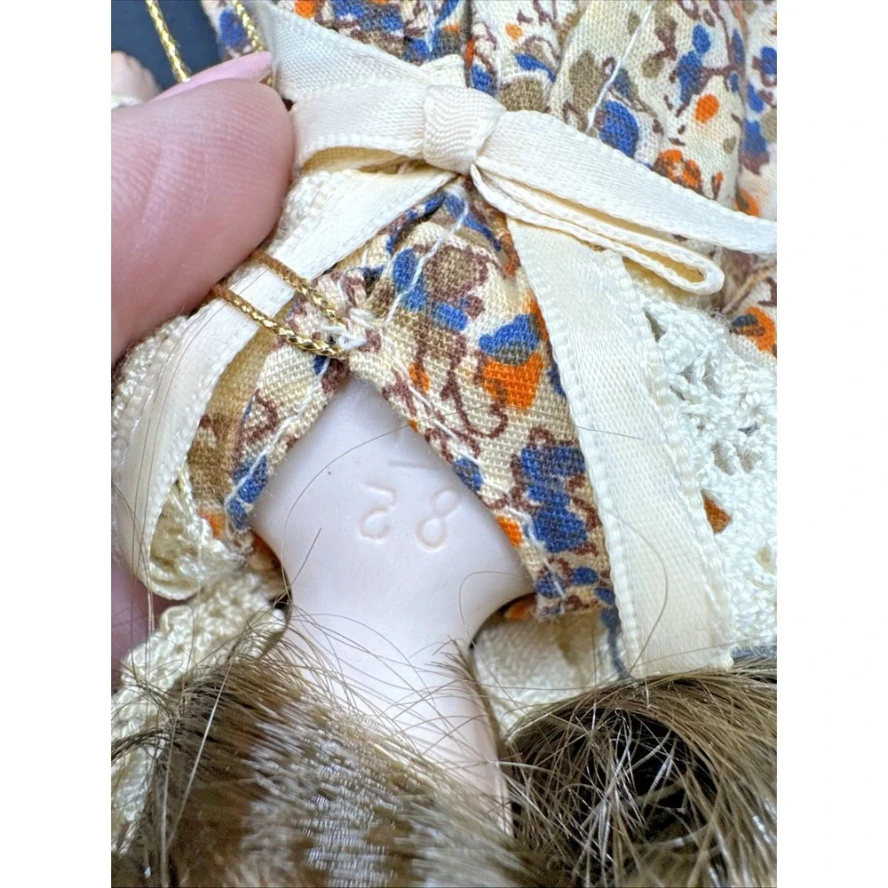 Vintage Porcelain Doll with 82‎ H.L. on neck